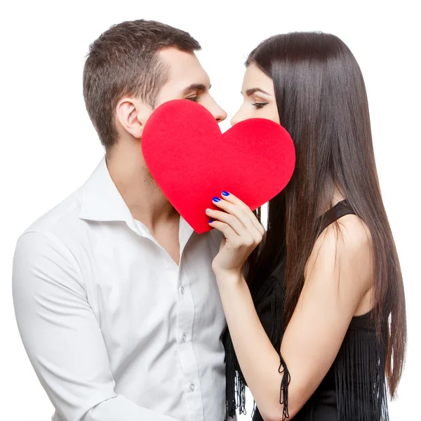 Young beautiful couple with present isolated on white — Stock Photo, Image