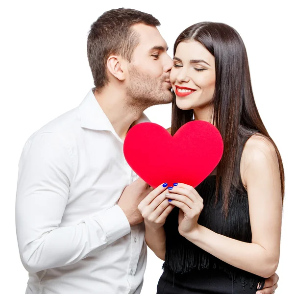 Jeune beau couple avec présent isolé sur blanc — Photo