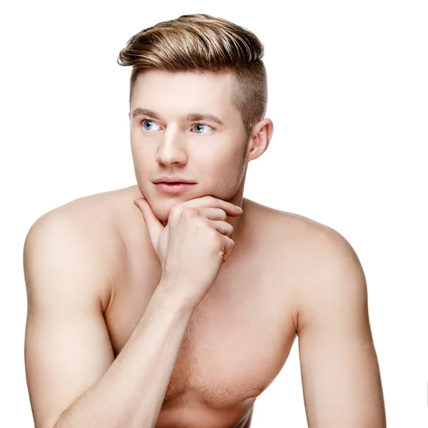 Молодой мужчина без рубашки, изолированный на белом — стоковое фото