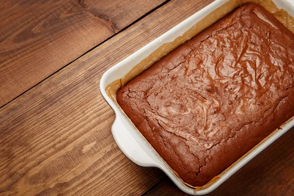 Chocolate cake on a baking sheet — Stock Photo, Image