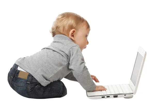 Baby with pc Royalty Free Stock Images