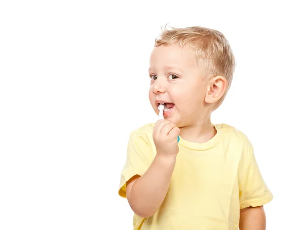 Child brushing teeth Royalty Free Stock Images