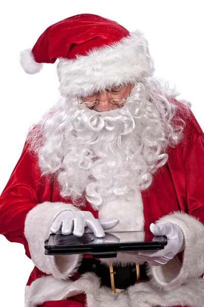 Santa claus portret met Tablet PC — Stockfoto