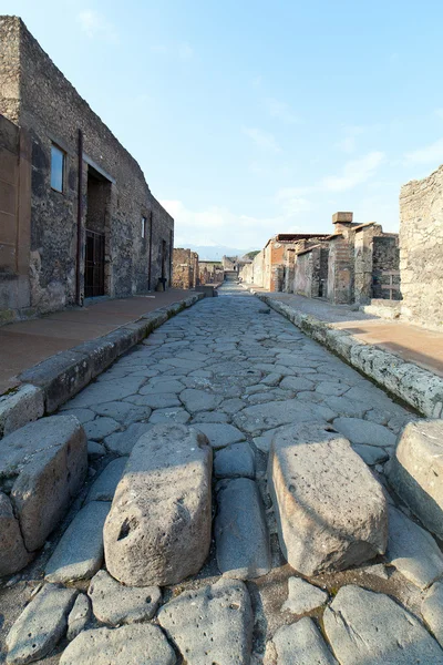 Ulice v ruinách Pompejí, Itálie. — Stock fotografie