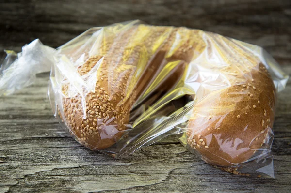 Bread roll in bag. — Stock Photo, Image
