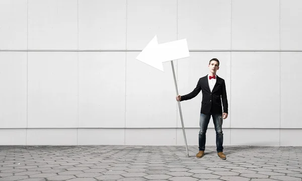 Guy showing roadsign — Stock Photo, Image