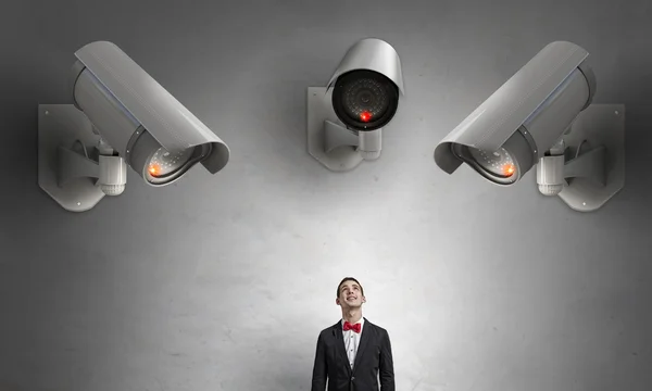 Camera keep an eye on man — Stock Photo, Image