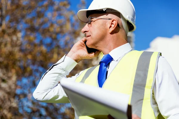 Engineer builder at construction site — Stock Photo, Image