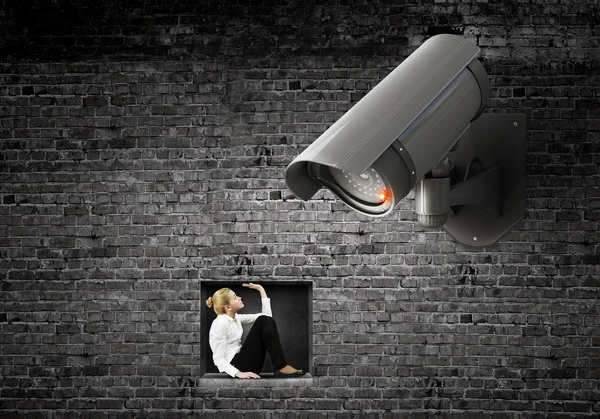 Camera keep an eye on woman — Stock Photo, Image