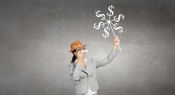 Businesswoman trying paper mustache — Stock Photo, Image