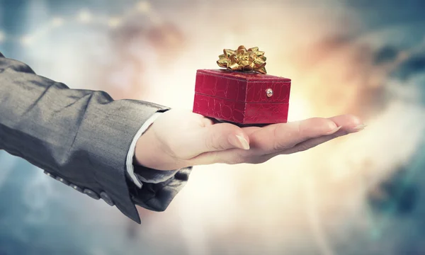 Man presenting his gift — Stock Photo, Image