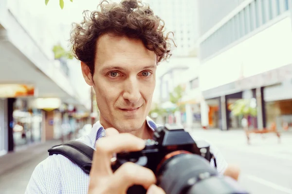 Male photographer taking picture — Stock Photo, Image