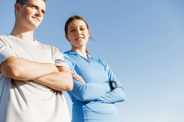 Young couple on beach training together — Stock Photo, Image