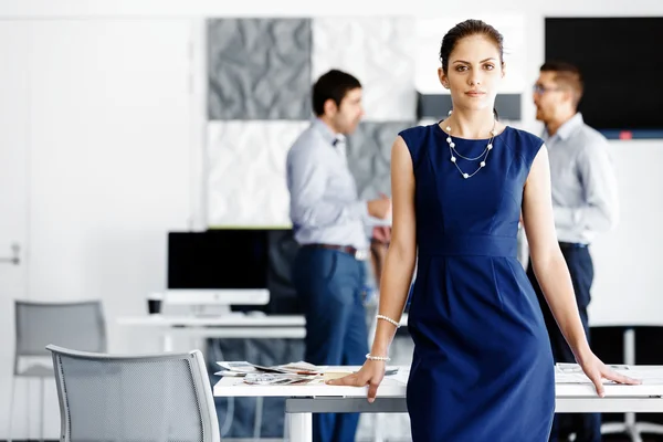 Attractive office worker standing — Stock Photo, Image