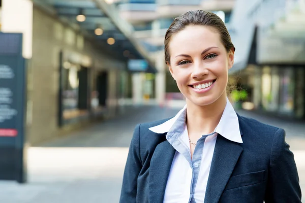 Portrait of business woman smiling outdoor Royalty Free Stock Photos