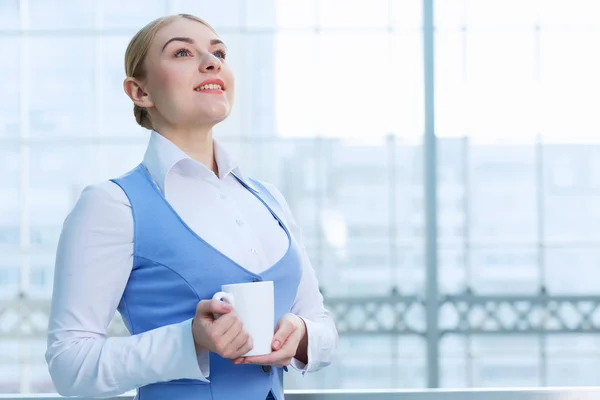 Attractive woman in office building — Stock Photo, Image