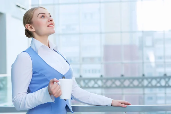 Attractive woman in office building — Stock Photo, Image