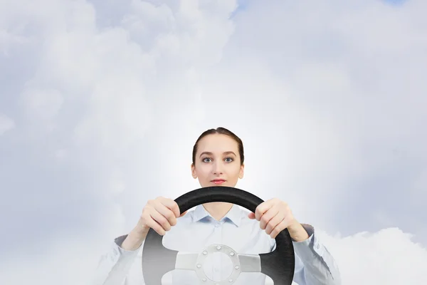 Woman with steering wheel — Stock Photo, Image