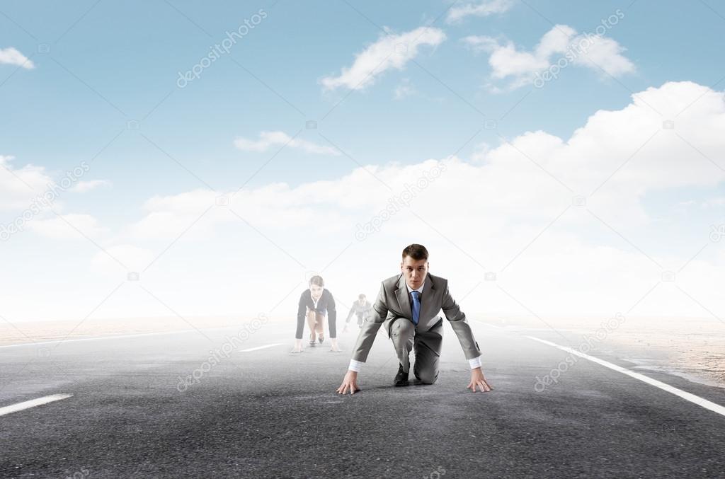 Business people running race