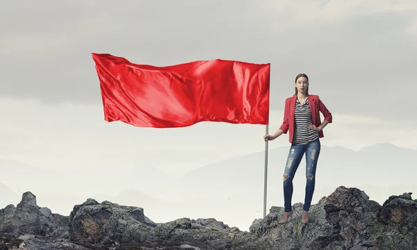 Mujer con bandera roja —  Fotos de Stock