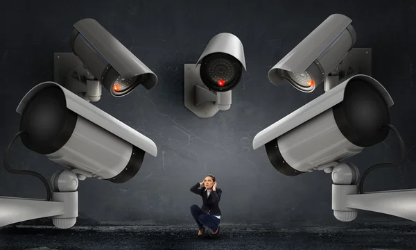 Camera keep an eye on woman — Stock Photo, Image