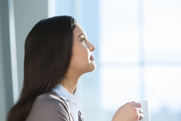 Attractive woman in office building — Stock Photo, Image