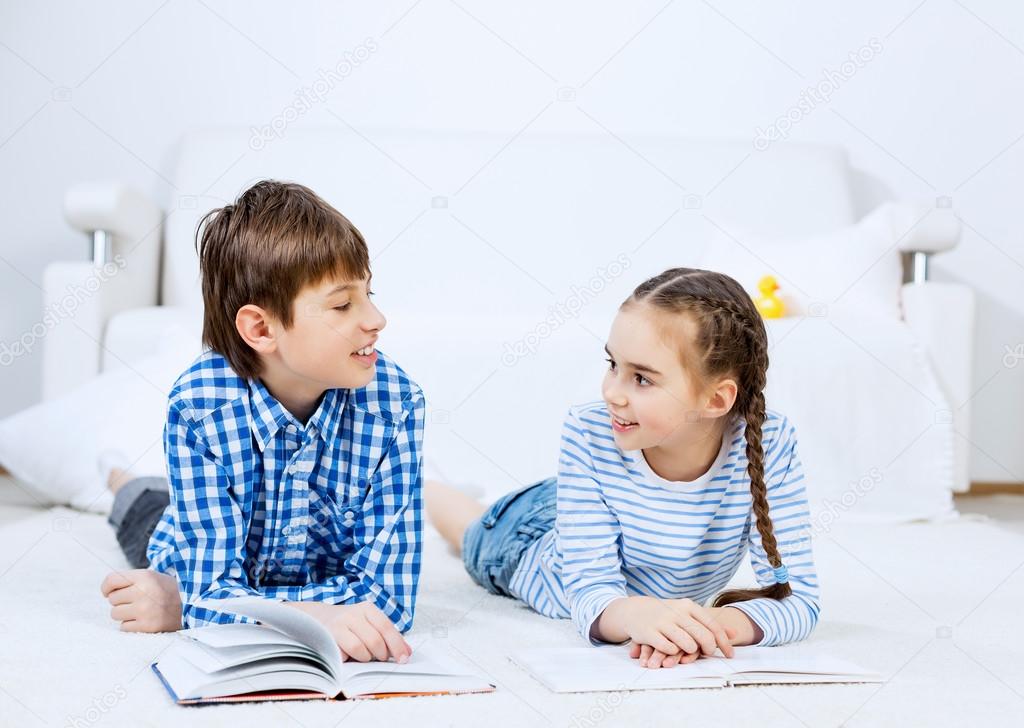 Cute kids reading books