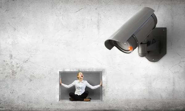 Camera keep an eye on woman — Stock Photo, Image