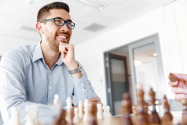 Young man playing chess