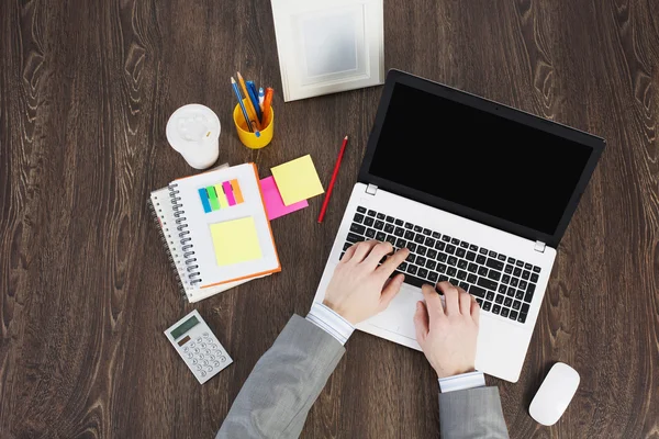 Office workplace with office supplies and laptop — Stock Photo, Image