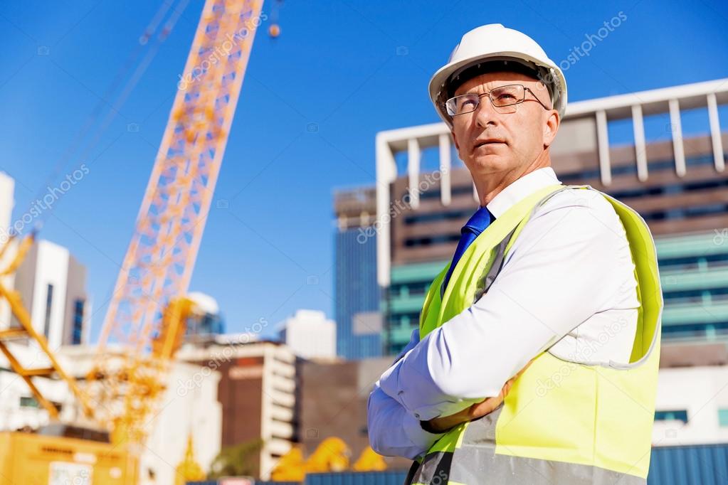 Engineer builder at construction site