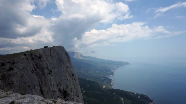 The formation of clouds between the mountains and the sea. Black Sea. Summer.Timelapse — Stock Video