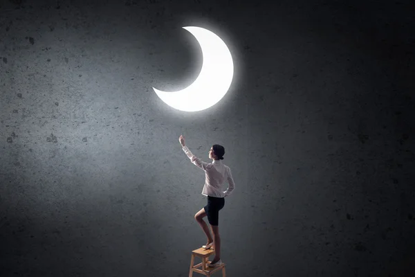 Woman touch the moon — Stock Photo, Image