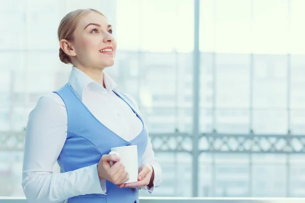 Attractive woman in office building — Stock Photo, Image