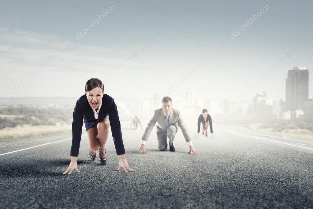 Business people running race