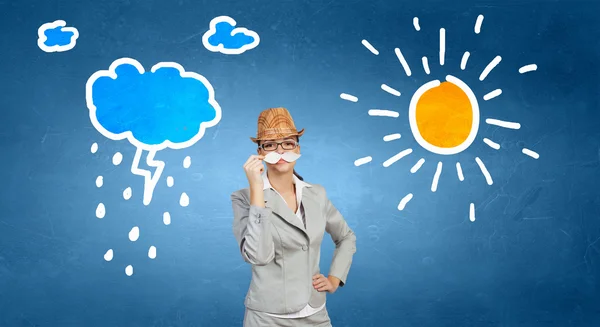 Businesswoman trying paper mustache — Stock Photo, Image