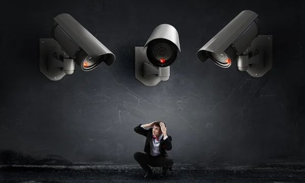 Camera keep an eye on man — Stock Photo, Image