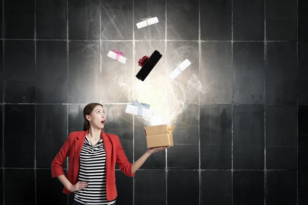 Girl holding box in hand — Stock Photo, Image