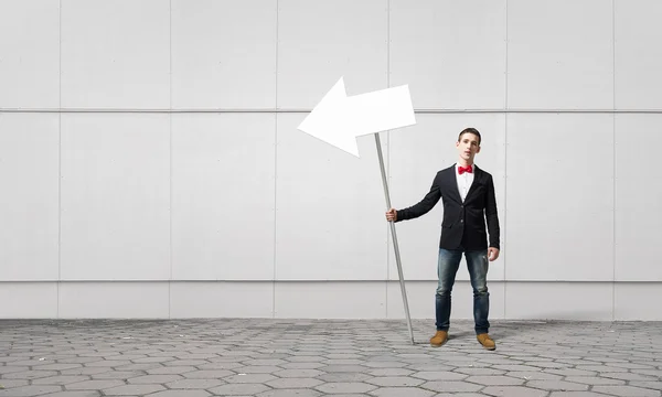 Guy showing roadsign — Stock Photo, Image