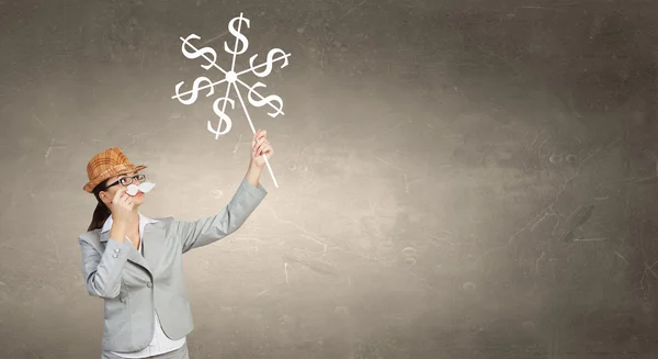 Businesswoman trying paper mustache — Stock Photo, Image