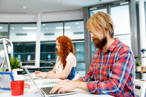 Two co-workers working together