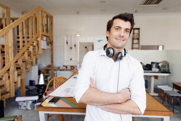 Portrait of young man wearing casual in office