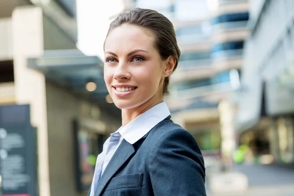 Portrait of business woman smiling outdoor Stock Photo