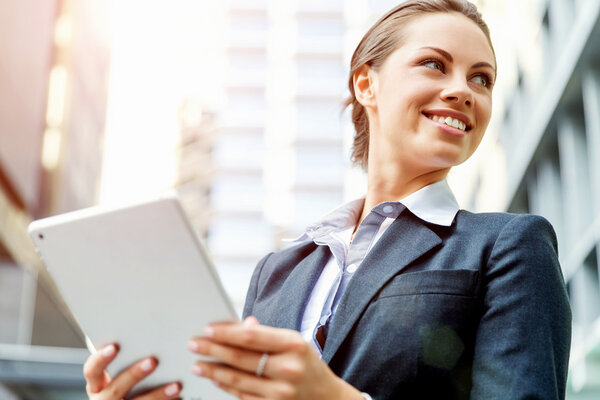 Portrait of business woman smiling outdoor