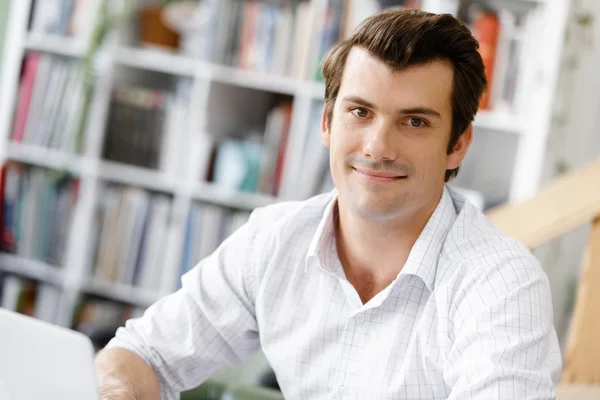 Young businessman in office — Stock Photo, Image