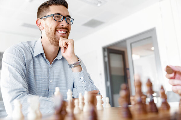 Young man playing chess