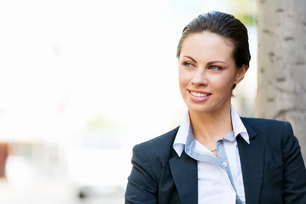 Portrait of business woman smiling outdoor Royalty Free Stock Images