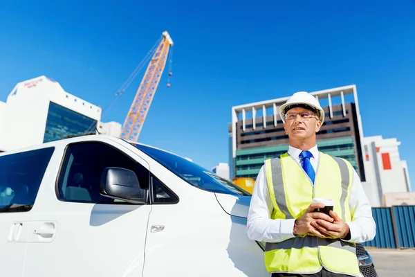 Engineer builder at construction site — Stock Photo, Image