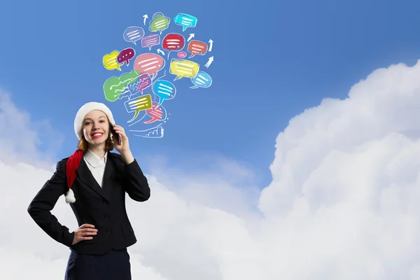 Santa woman with mobile phone — Stock Photo, Image