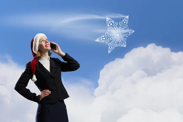 Santa woman with mobile phone — Stock Photo, Image